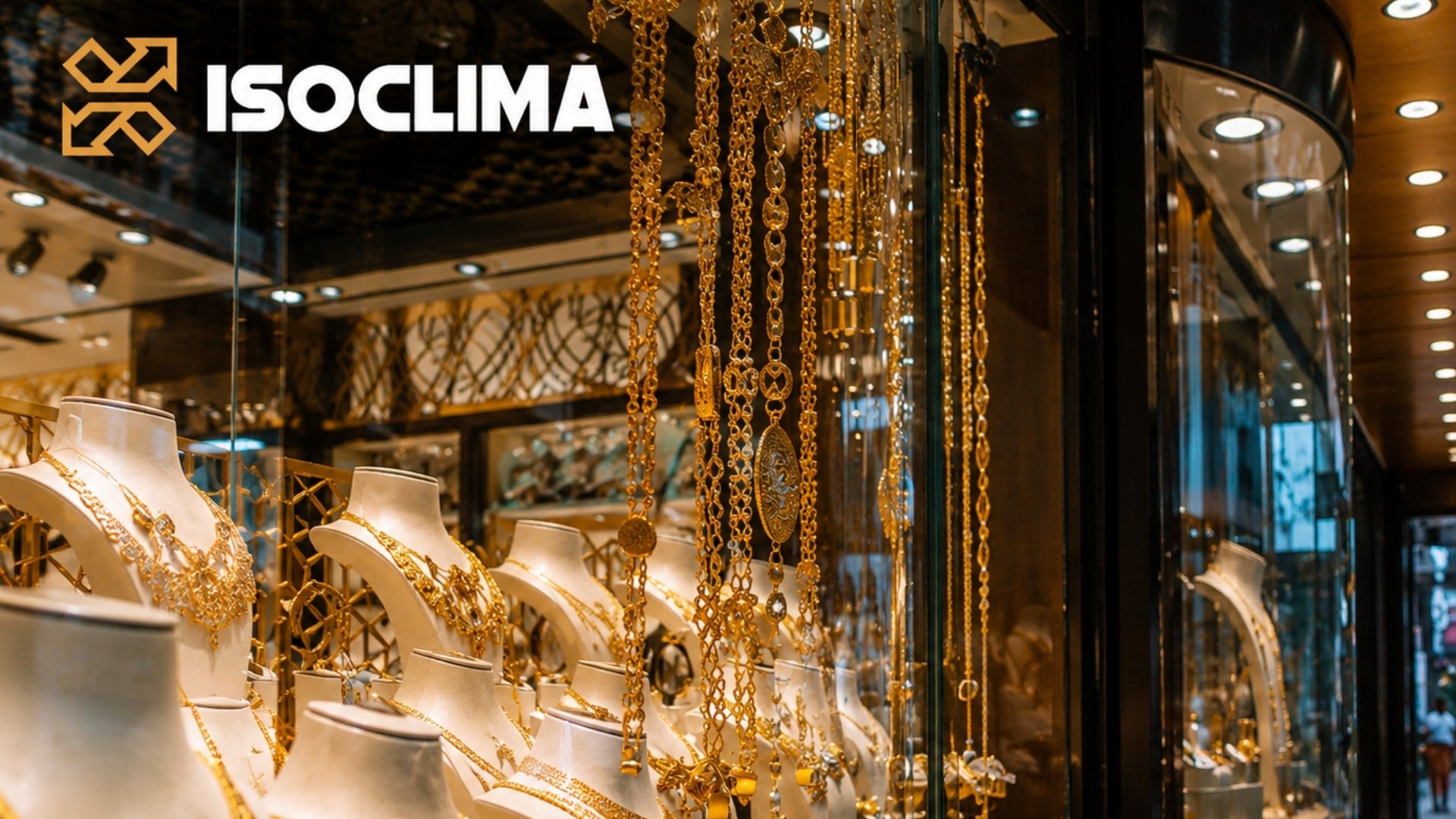 Luxurious jewelry boutique display with gold necklaces and ornate pieces on mannequins, warmly lit in glass cases; elegant, opulent atmosphere.